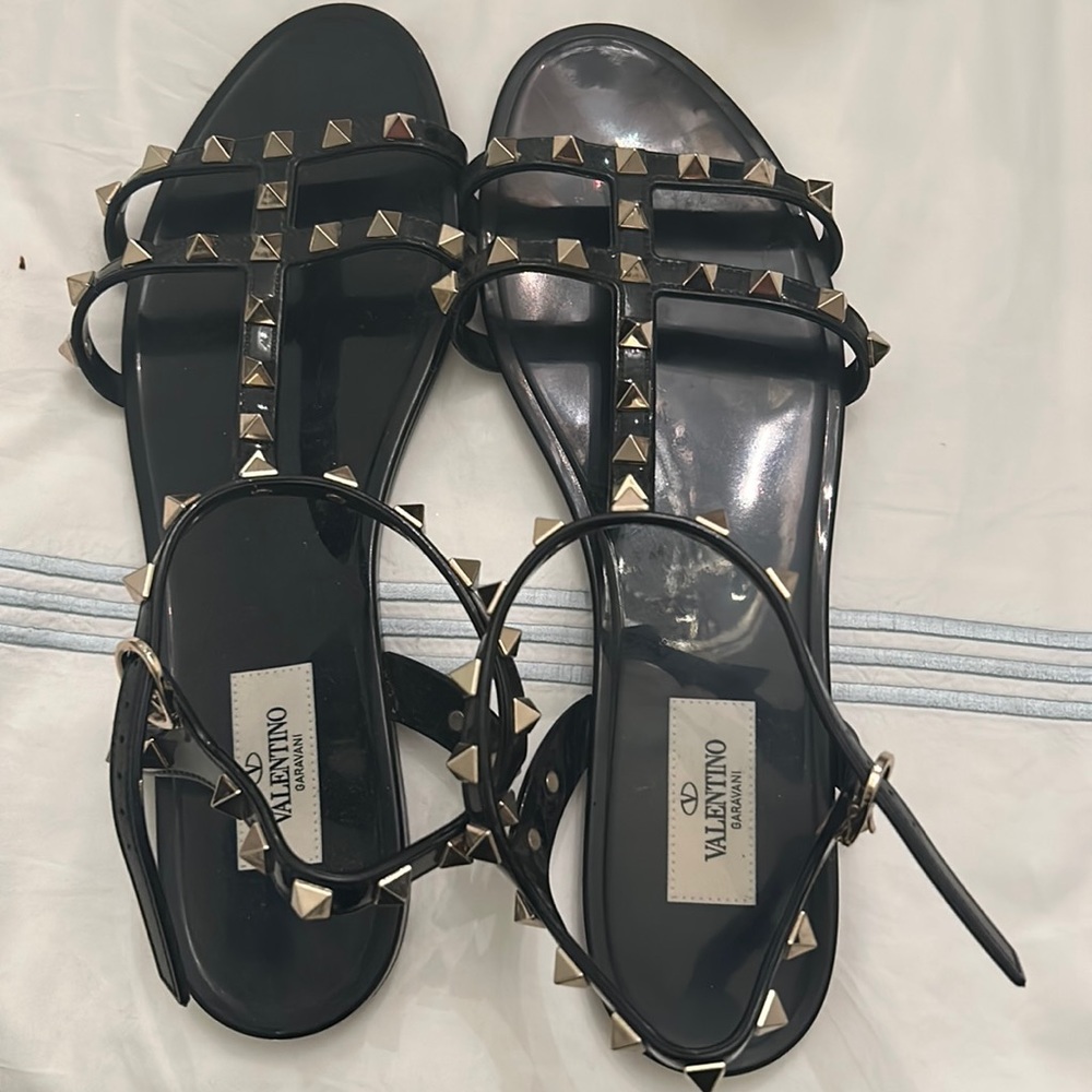 Valentino Garavani Rockstud rubber sandal 
- Platinum-finish studs